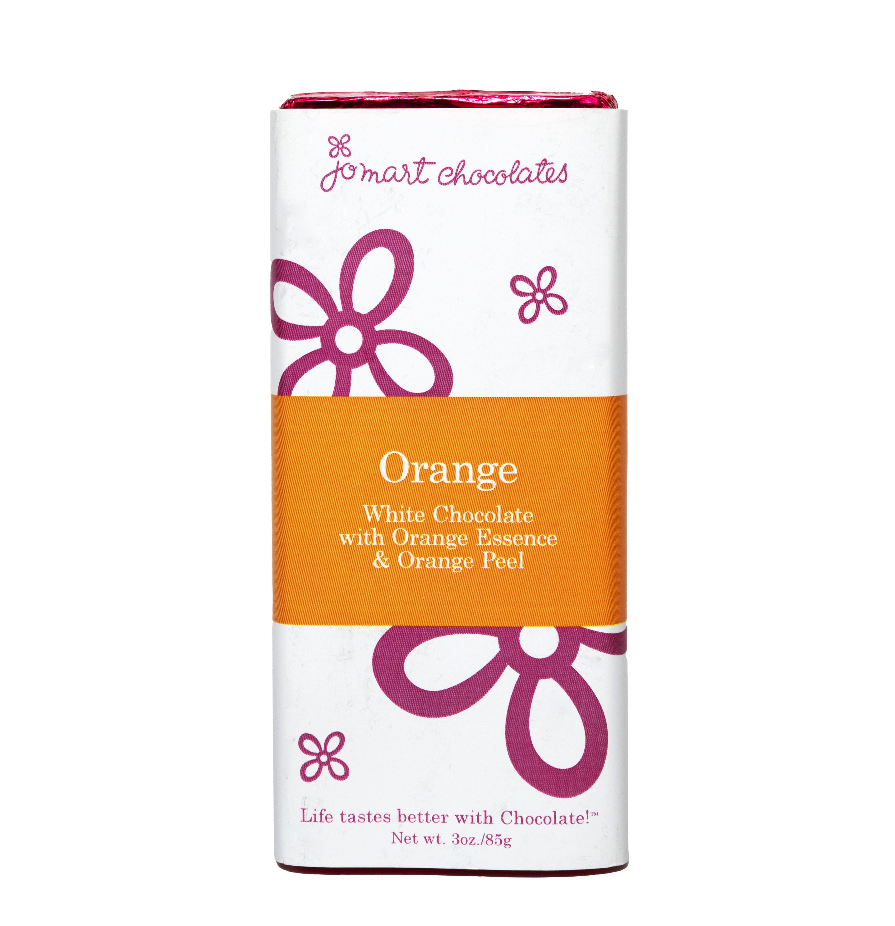 Chocolate bar with pink foil and wrapper with white background, purple logo and flowers, a orange square in the middle "Orange White Chocolate with Orange Essence & Orange Peel"