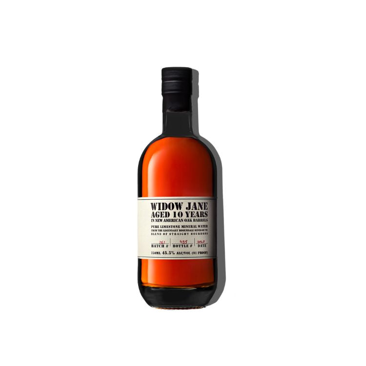 A bottle of Widow Jane Aged 10 Years Scotch whisky, featuring a dark amber-brown glass bottle, a cream-colored label with black text, and a black cap, set against a plain white background.