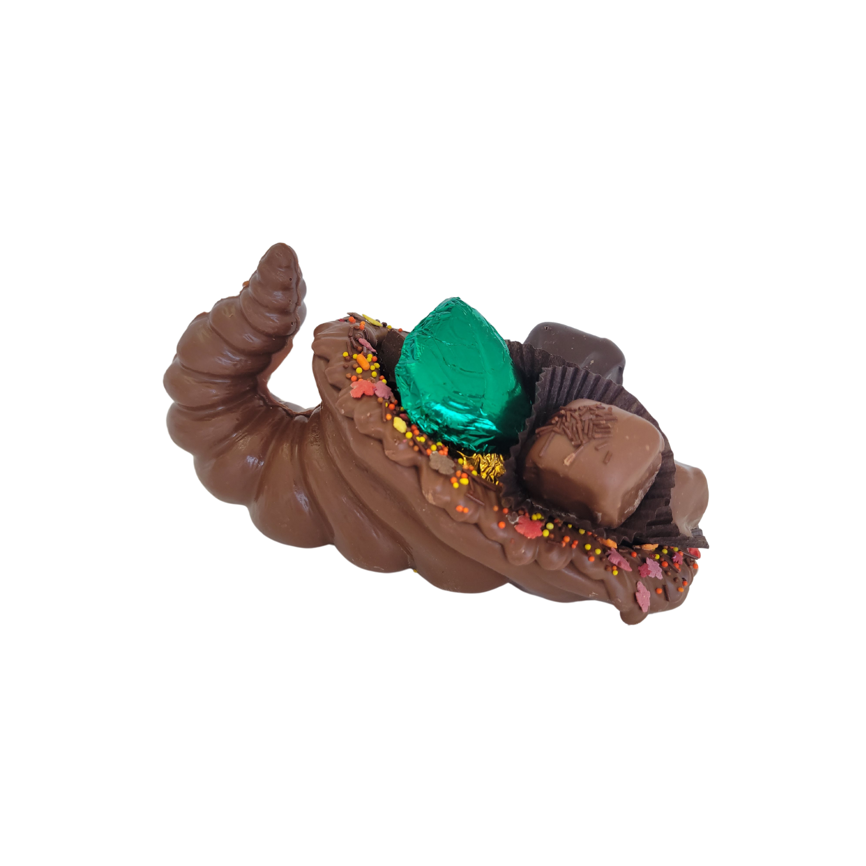 chocolate cornucopia with chocolates in brown cups and decorations