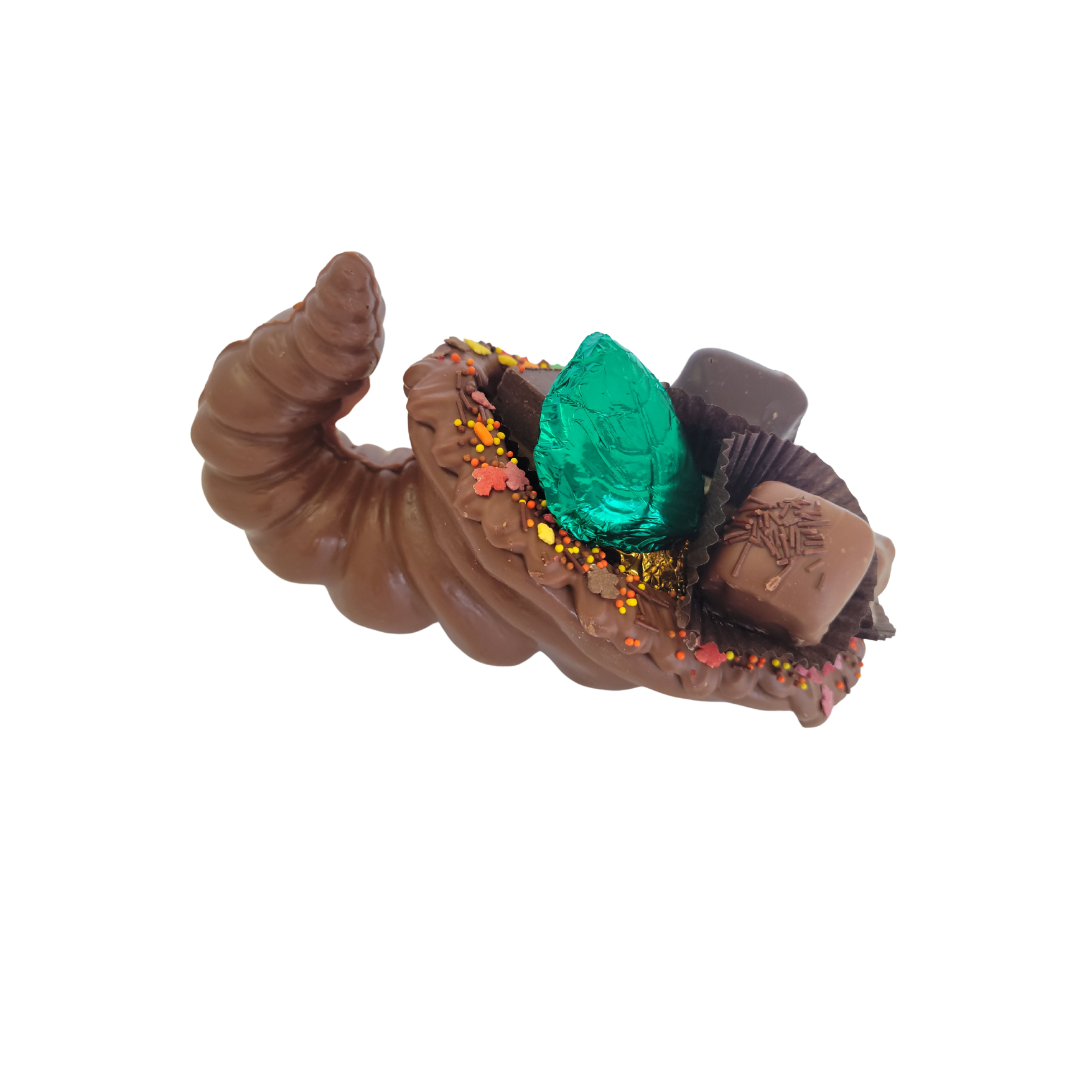 chocolate cornucopia with chocolates in brown cups and decorations