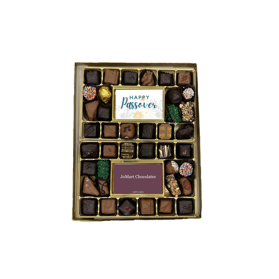 Box of assorted chocolates with a 'Happy Passover' card on a white background