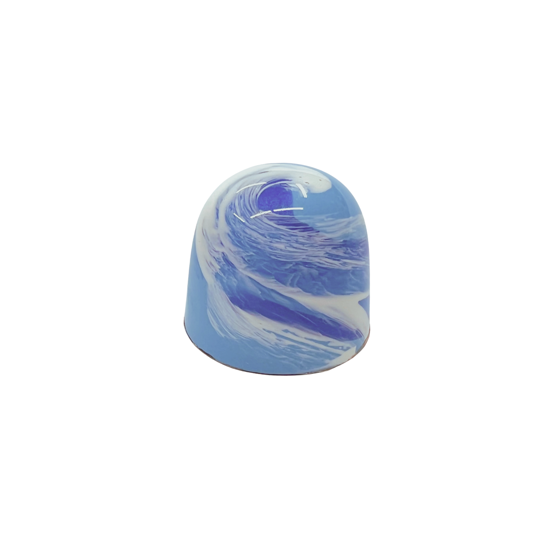 dome shaped bonbon with blue and white cocoa butter