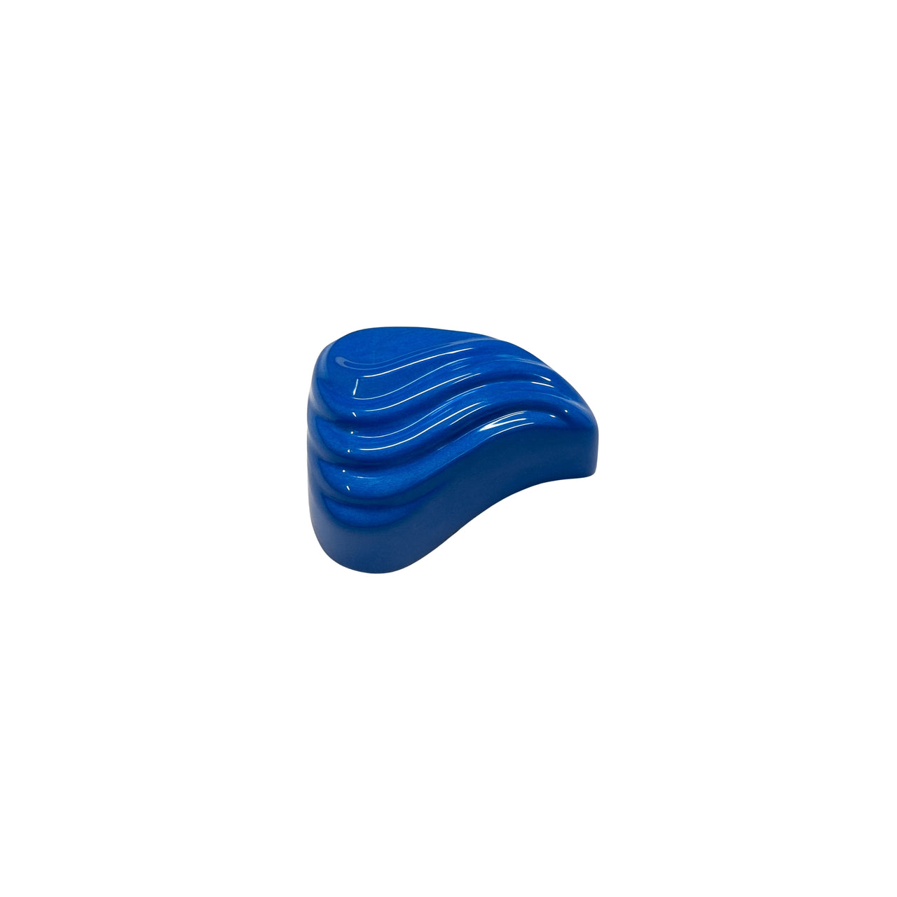 Blue plastic wave-shaped object on a white background