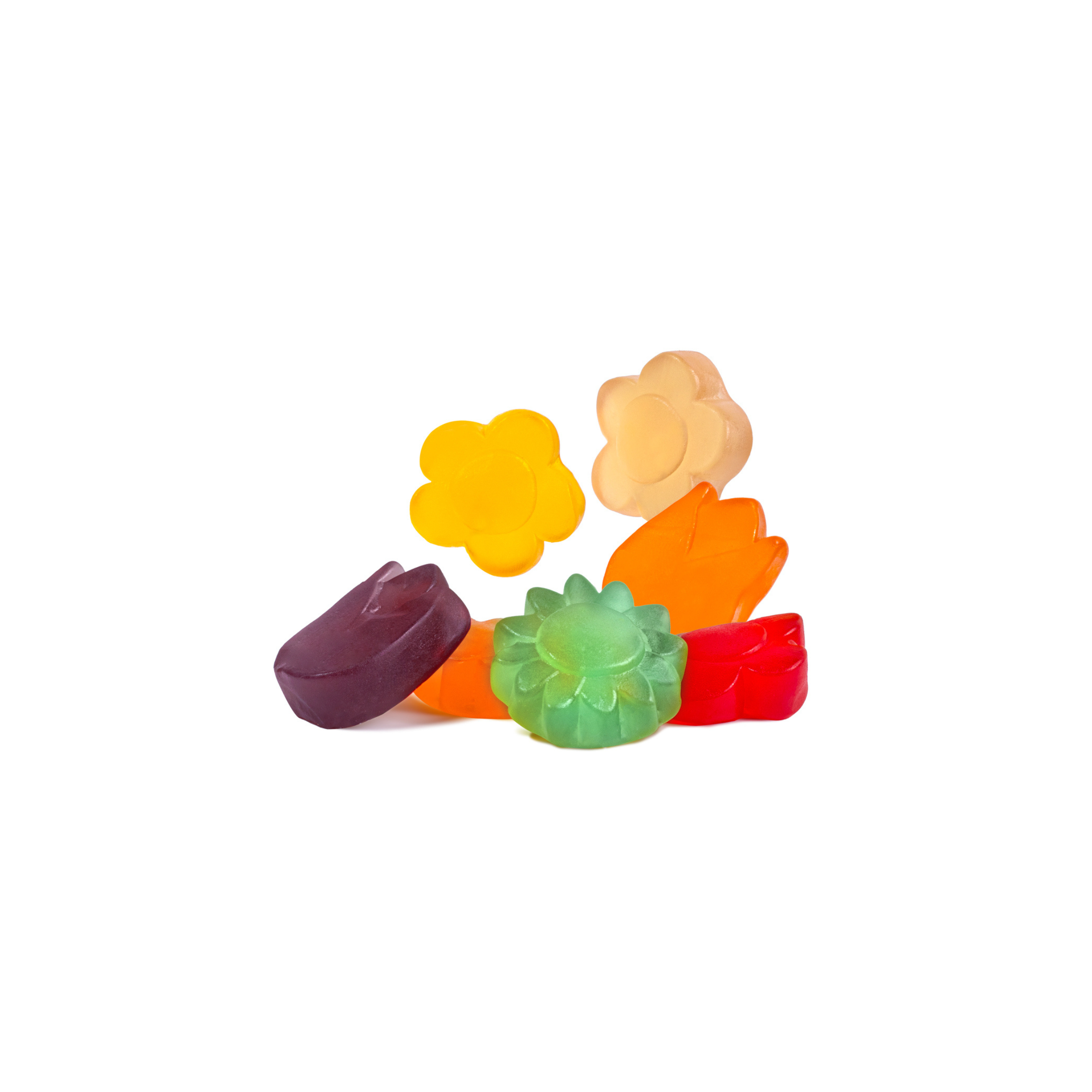 Colorful flower-shaped gummy candies on a white background
