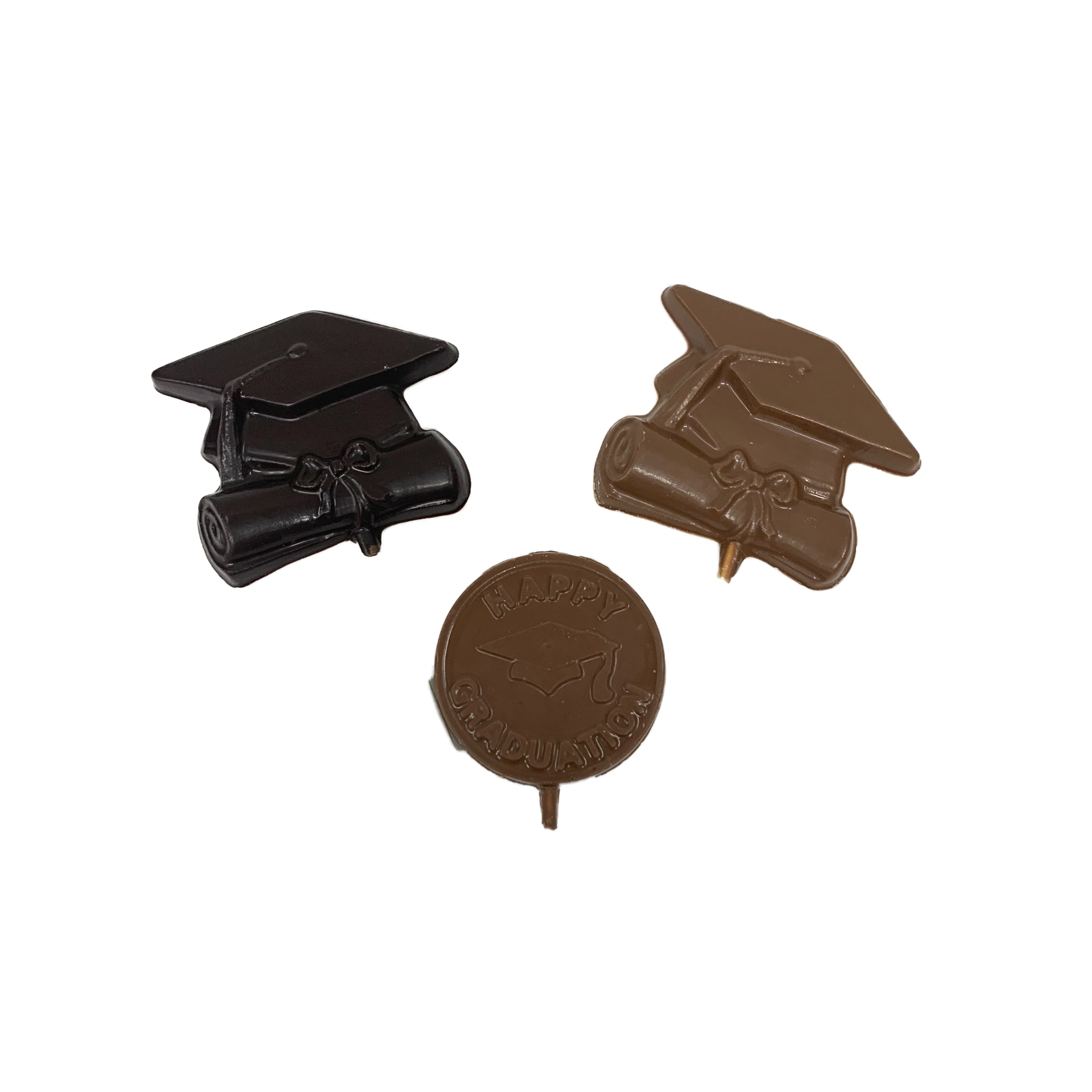 Three chocolate graduation caps on a white background