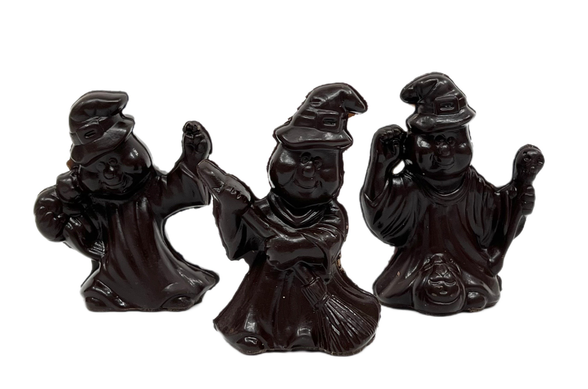 three dark chocolate molded witches