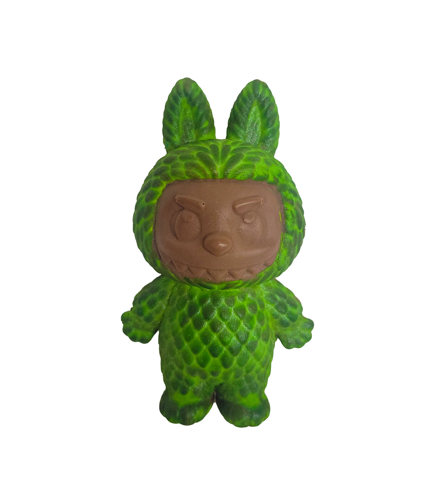 Green textured chocolate figure with 0n a white background