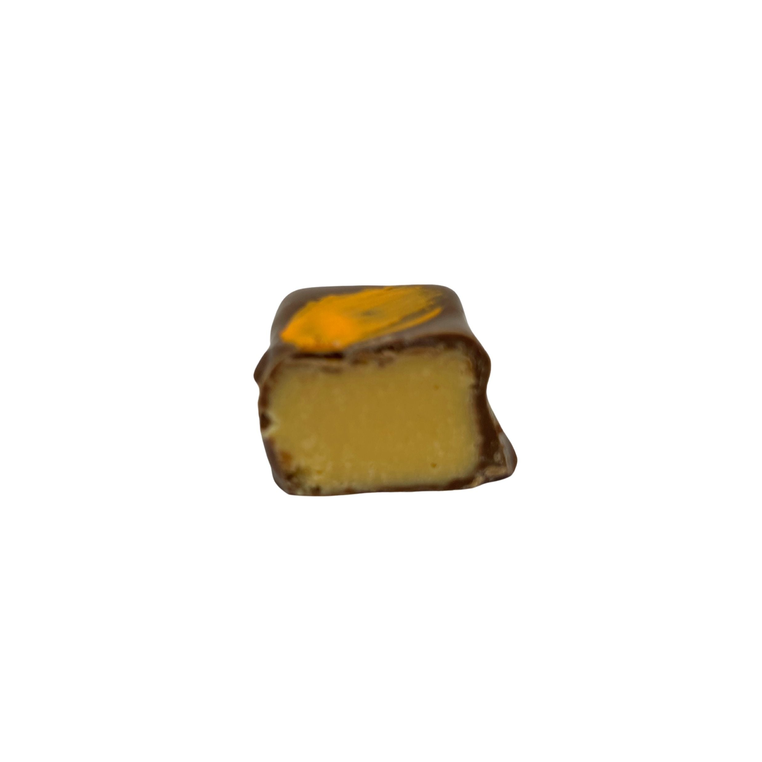 A single square chocolate confection with a dark brown chocolate coating and a bright yellow-orange filling, shown on a plain white background.