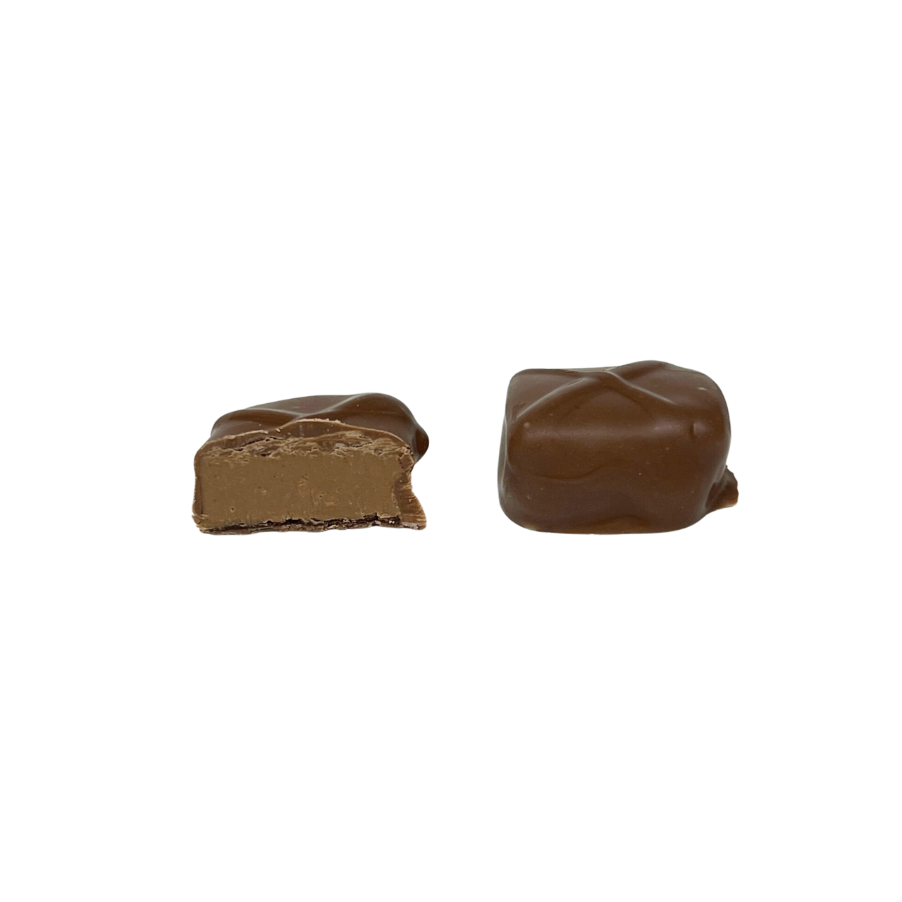 cut open chcolate covered with a layer of peanut butter fudge
