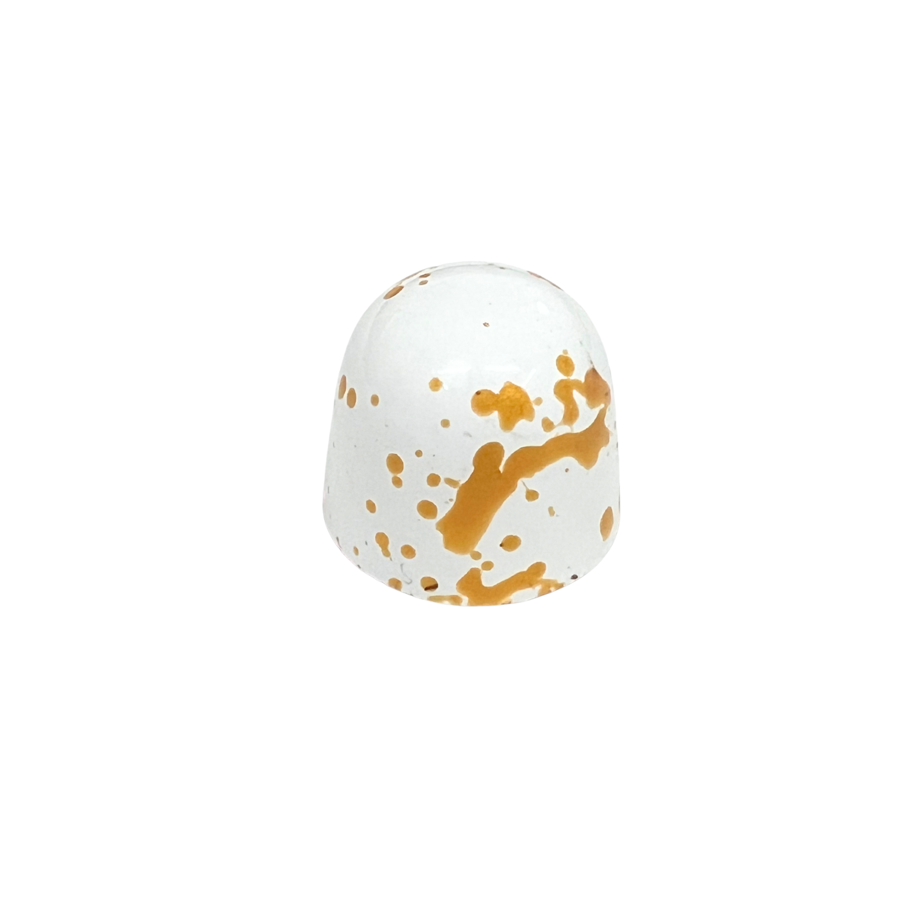 dome shaped chocolate with white and gold