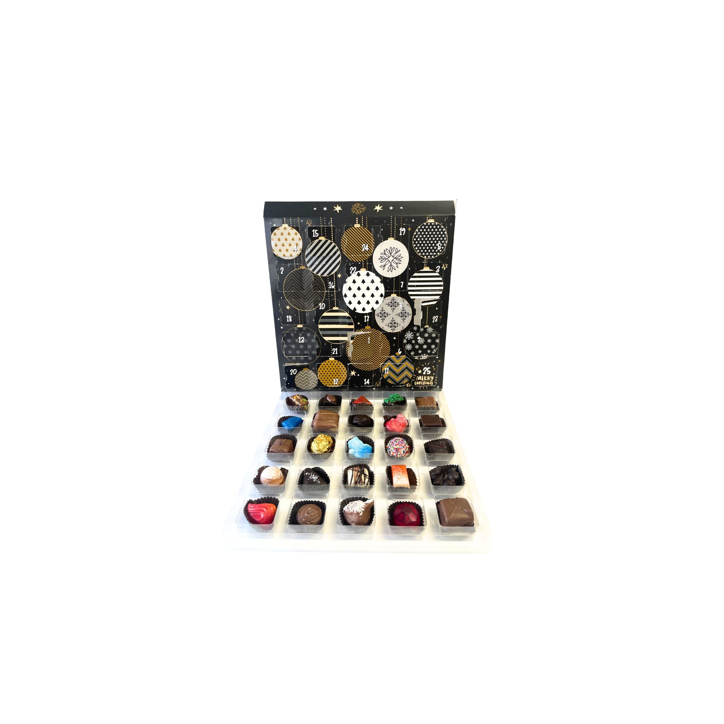 Assorted chocolates in front of a decorative box on a white background