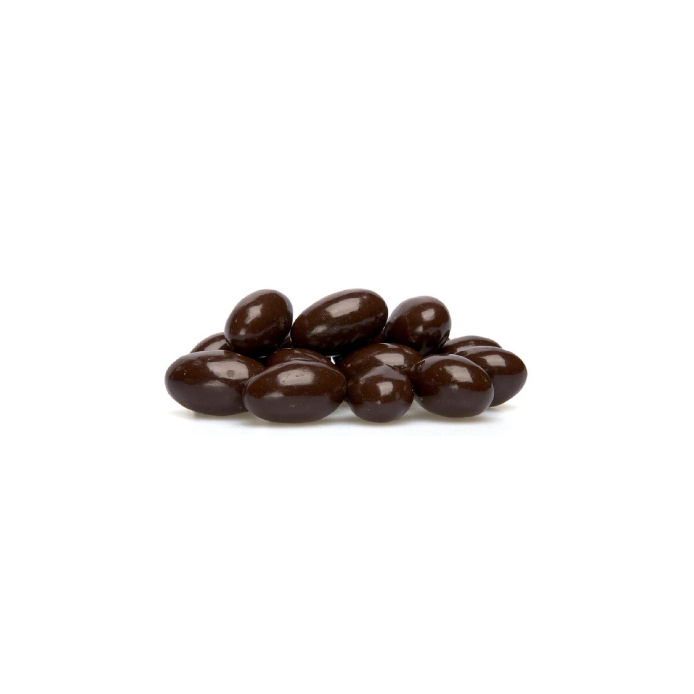 Brown chocolate-covered almonds on a white background