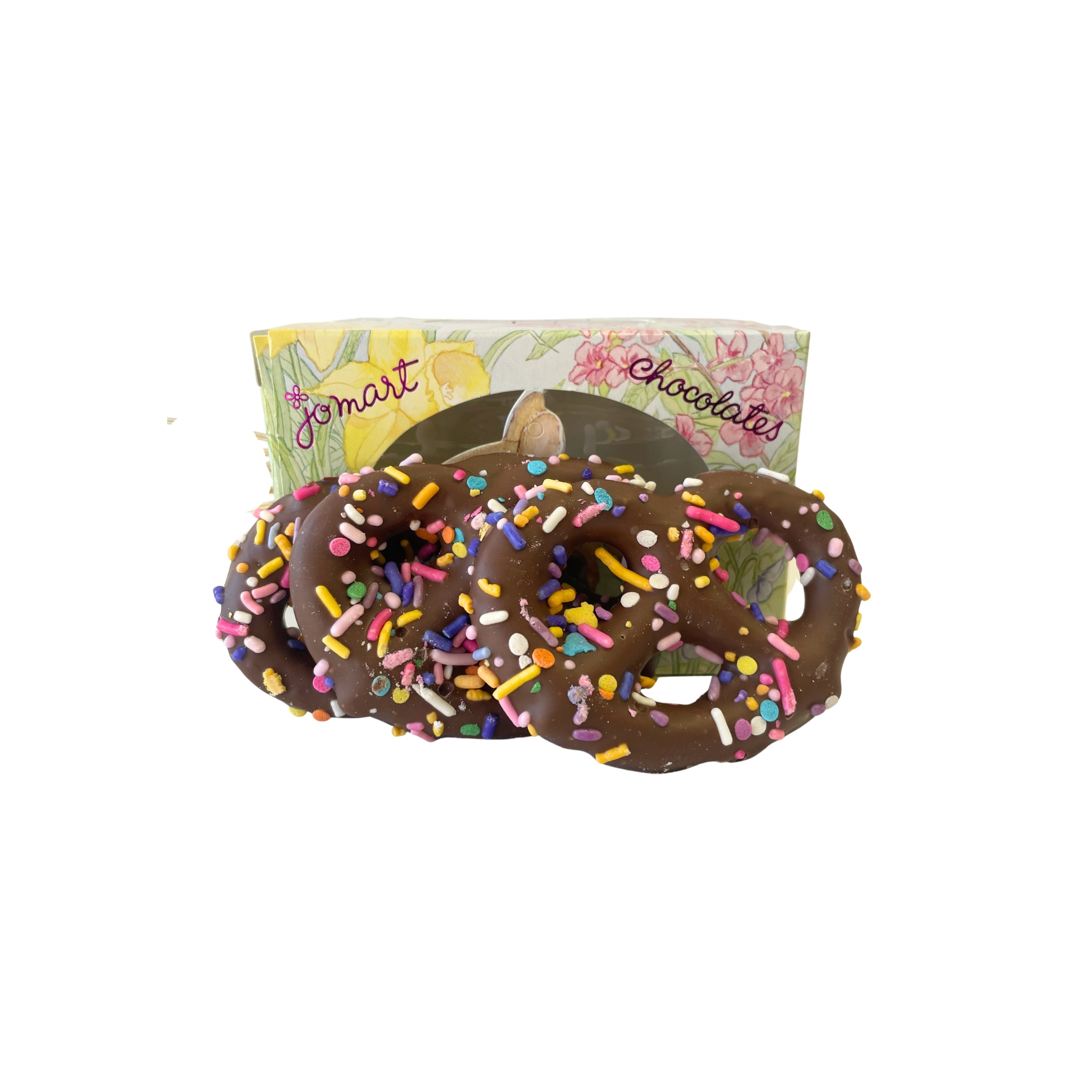 Chocolate pretzels with sprinkles on a white background