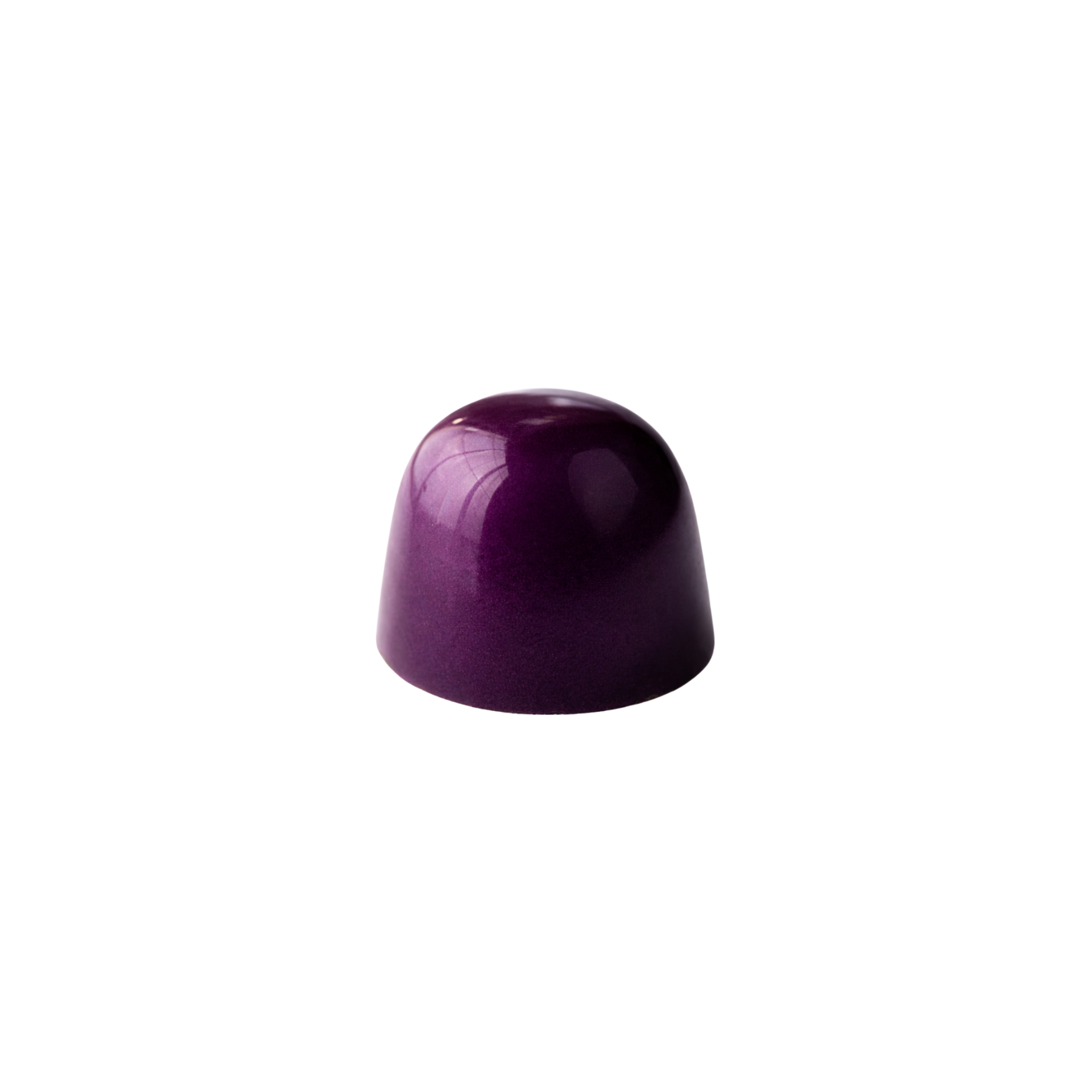 Purple dome shaped chocolate on a white background