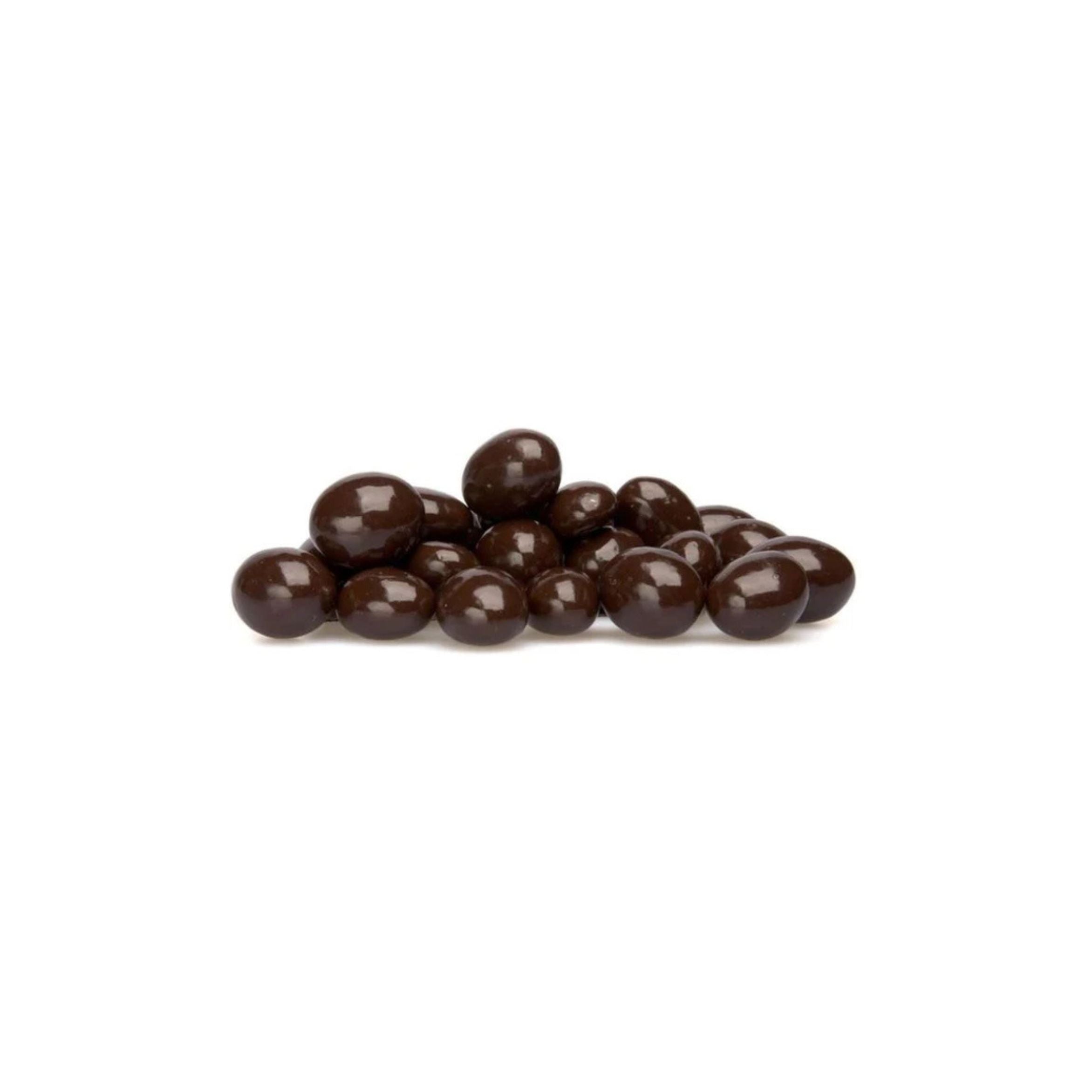 Dark chocolate candies on a white background