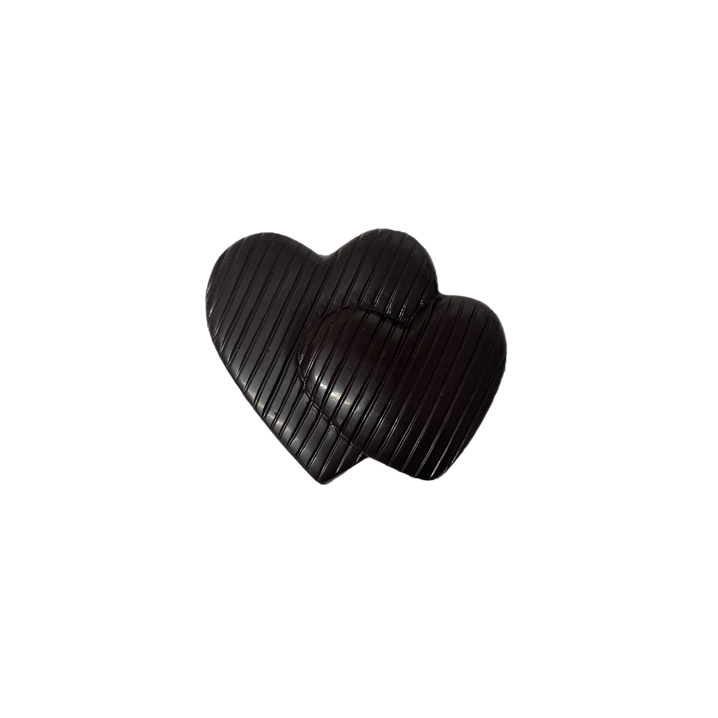 Two Heart-shaped chocolates on a white background