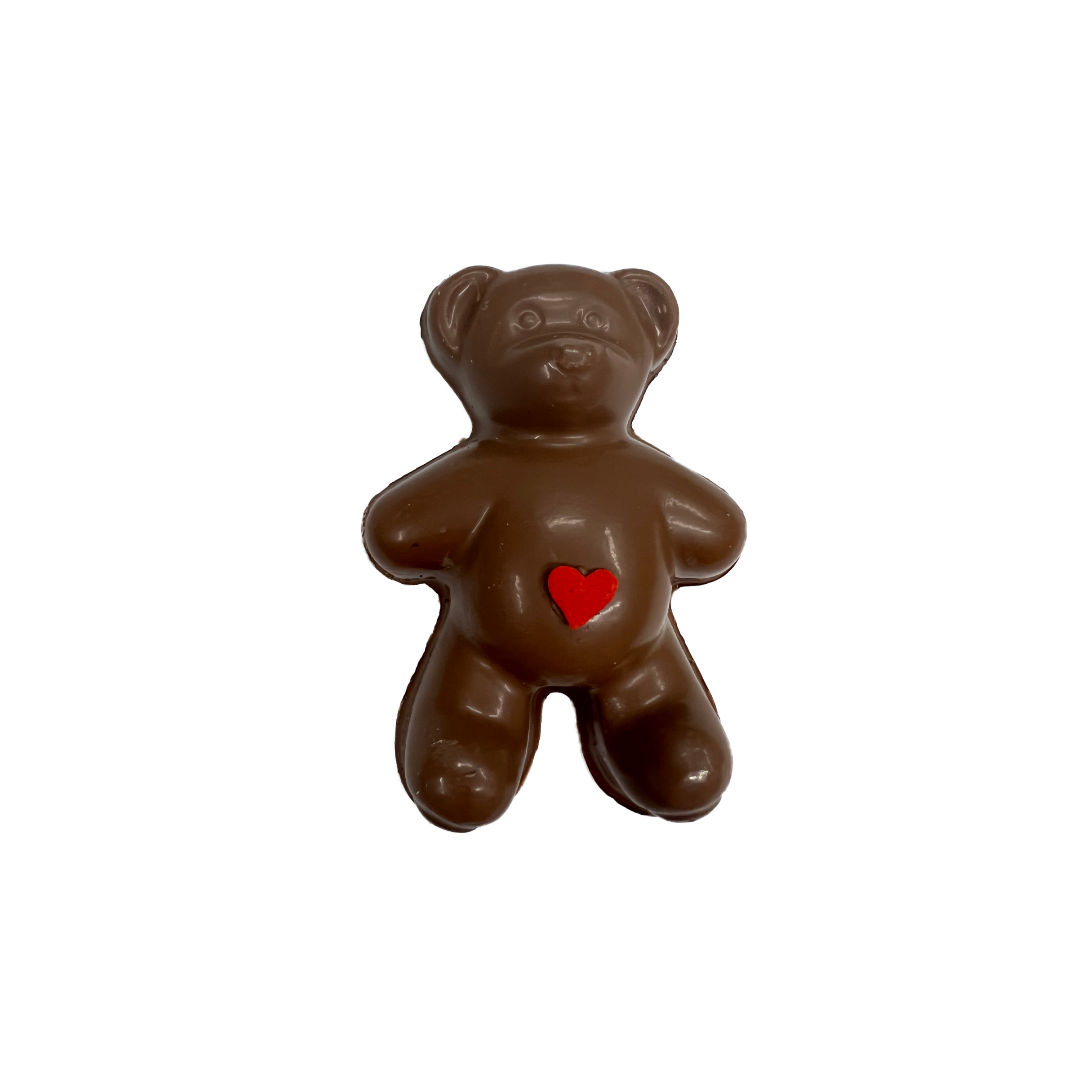 Chocolate bear with a red heart on a white background