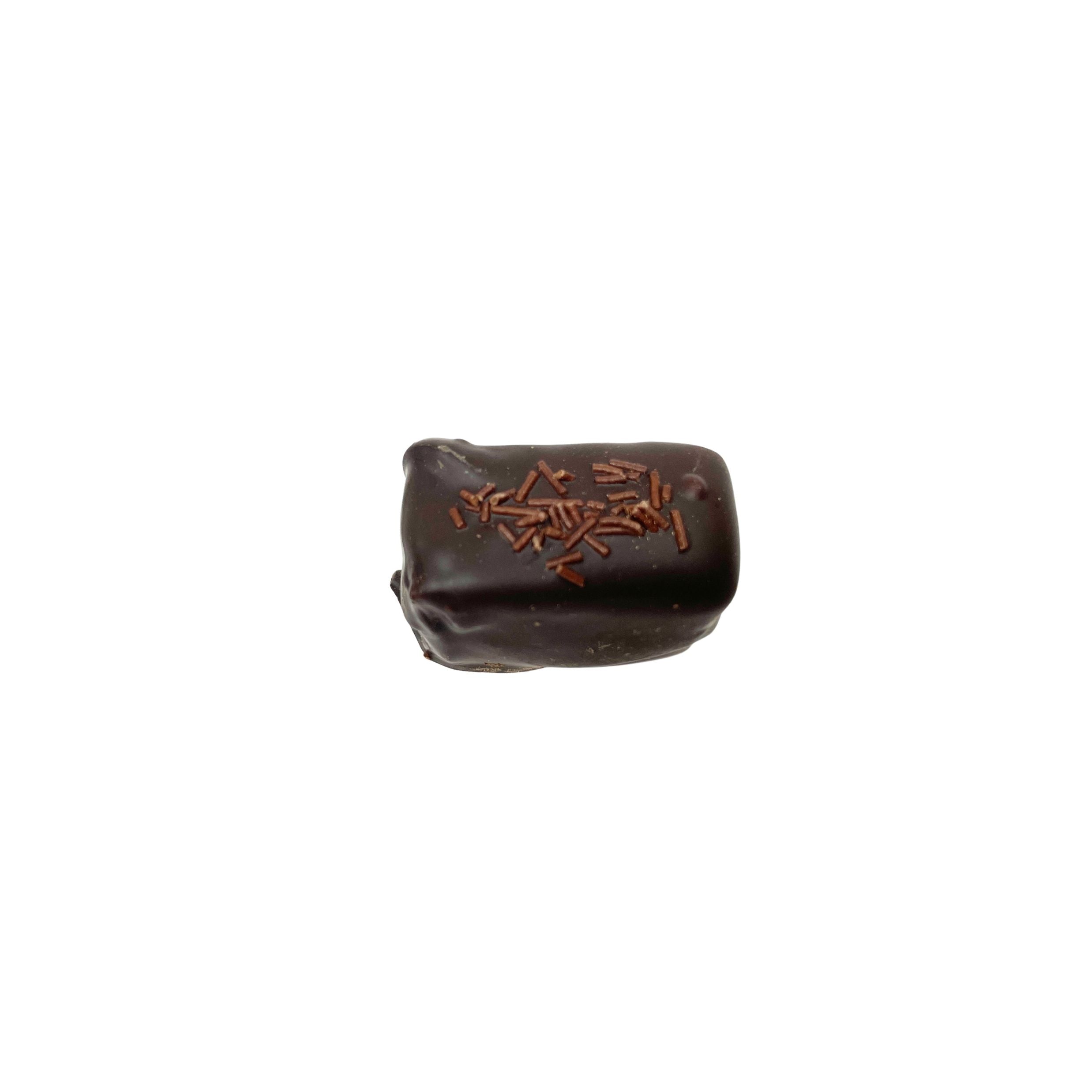 dark chocolate rectangle candy with chocolate sprinkles on a white background