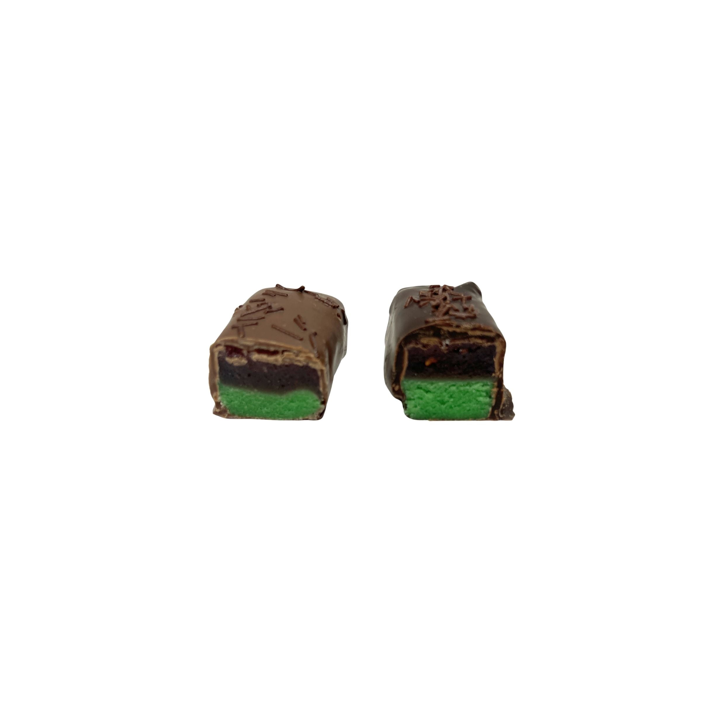 Two chocolate-covered candy bars with a bright green layer visible on the cut ends, shown on a plain white background.