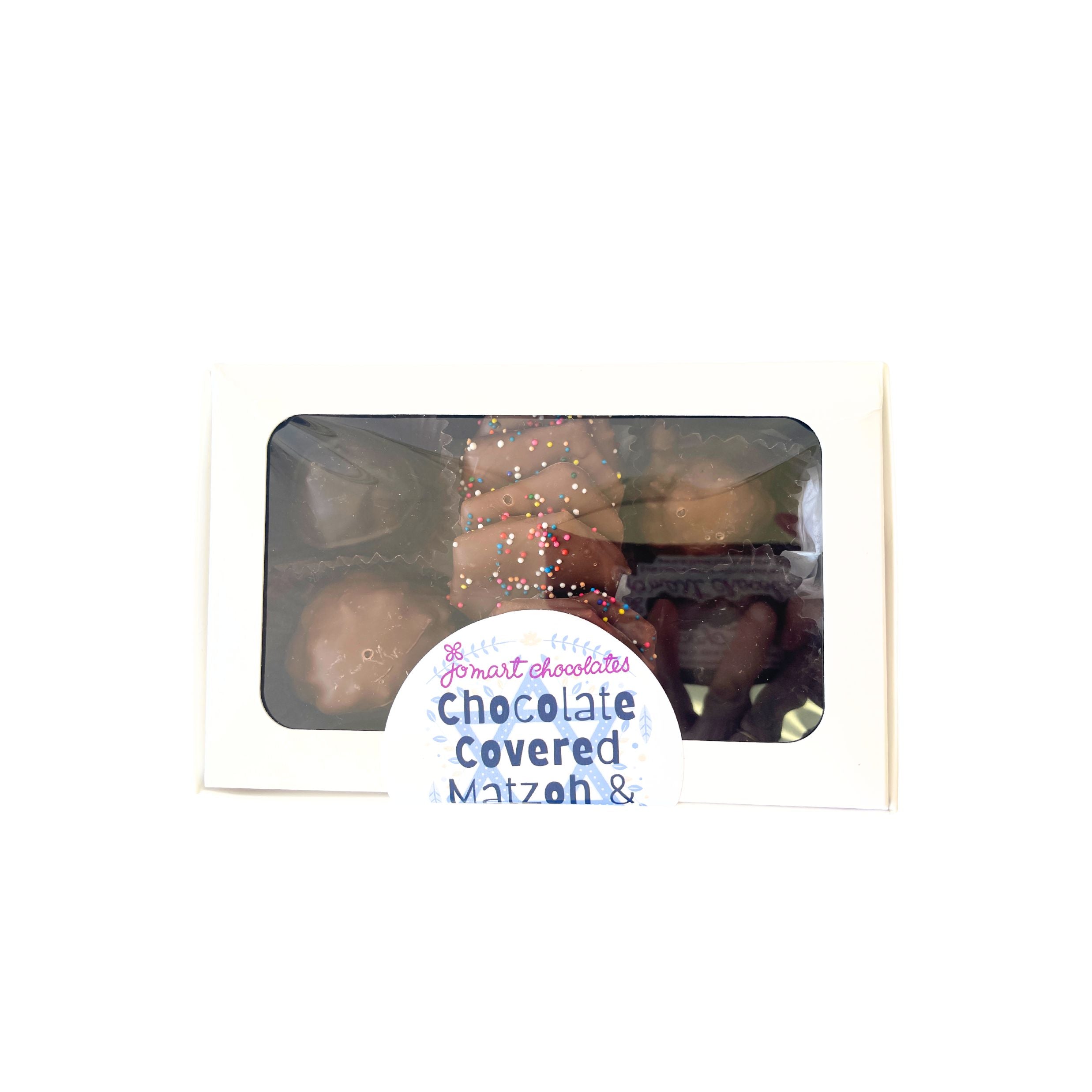 Box of chocolate-covered matzoh with a label on a white background