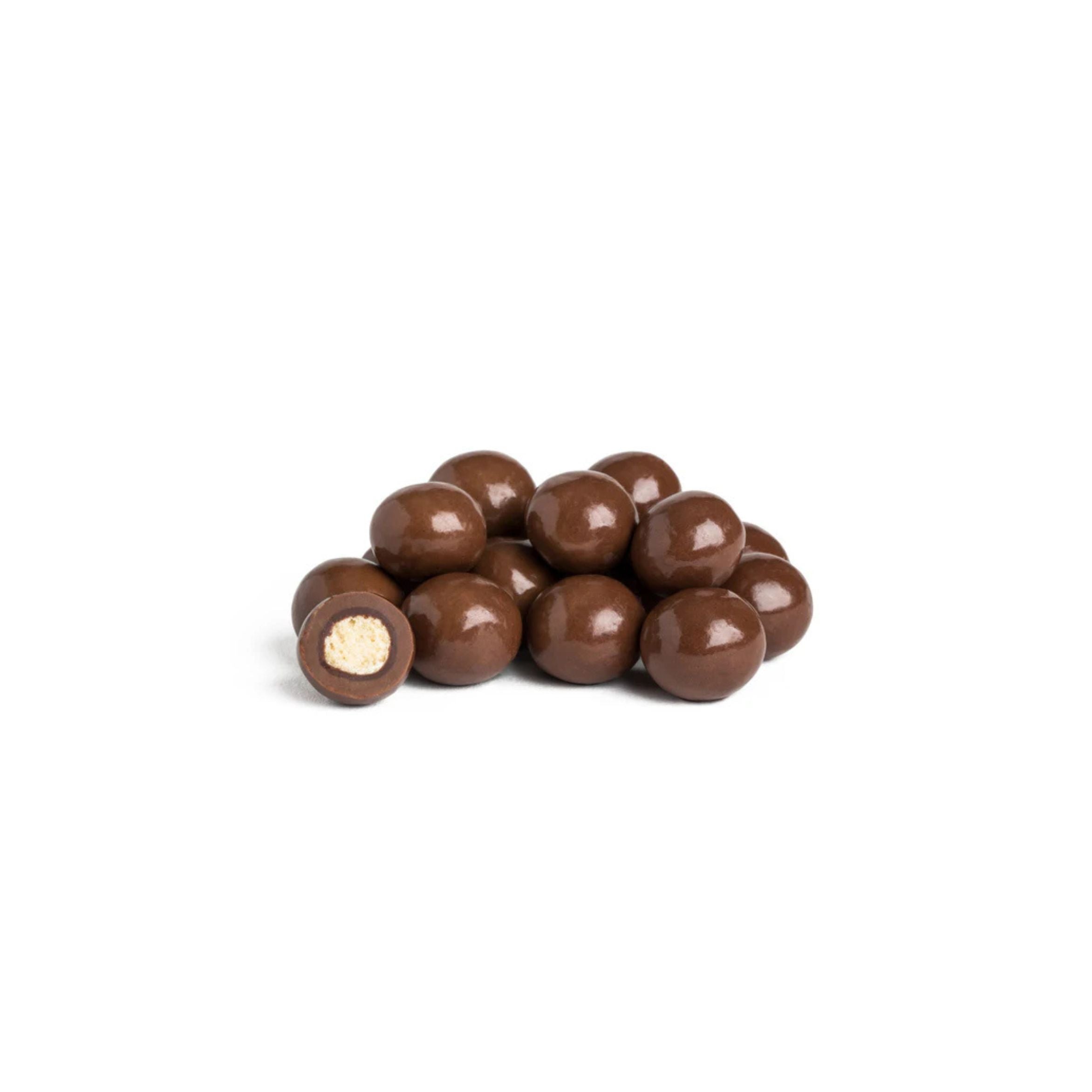 Chocolate-covered candies on a white background