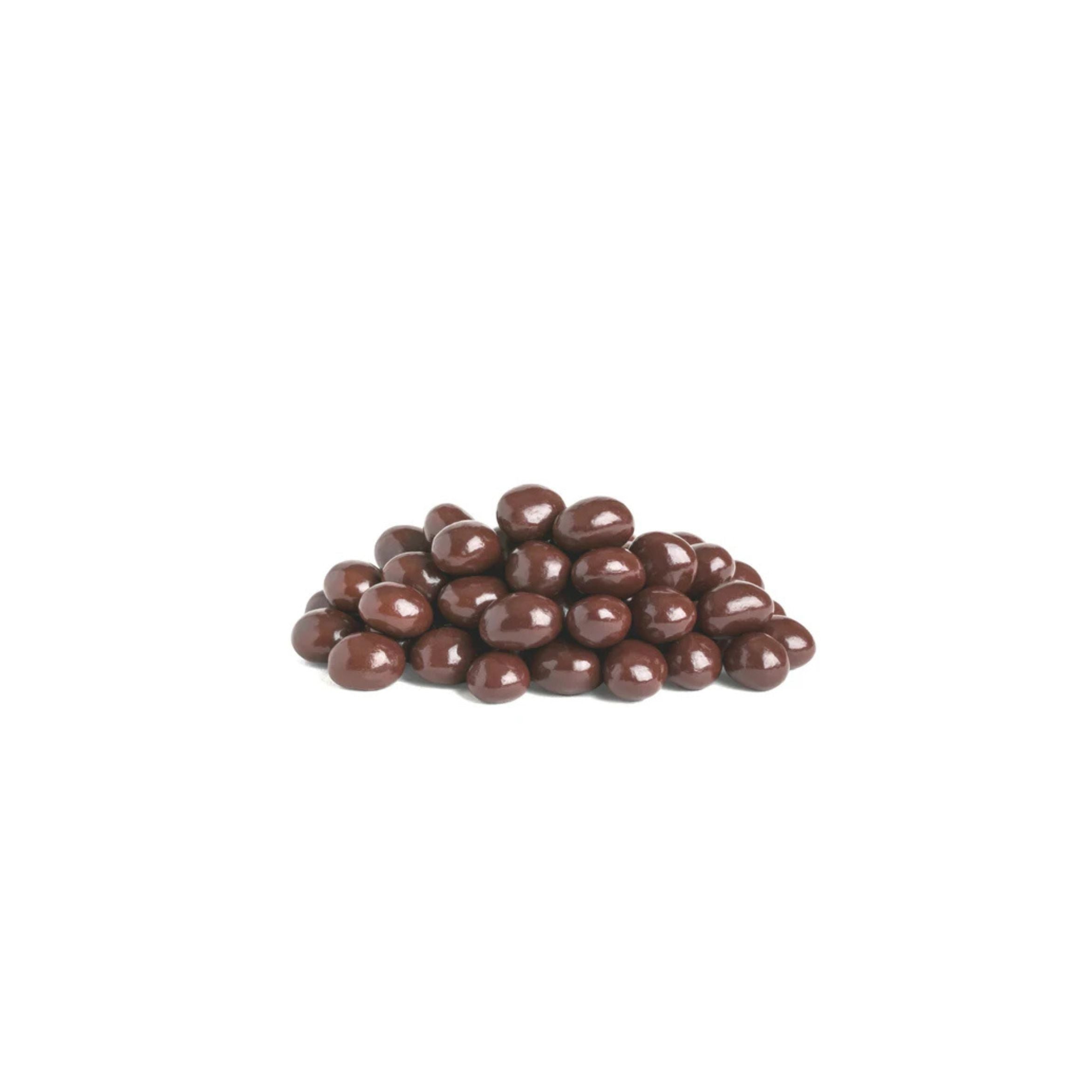 Chocolate-covered candies on a white background