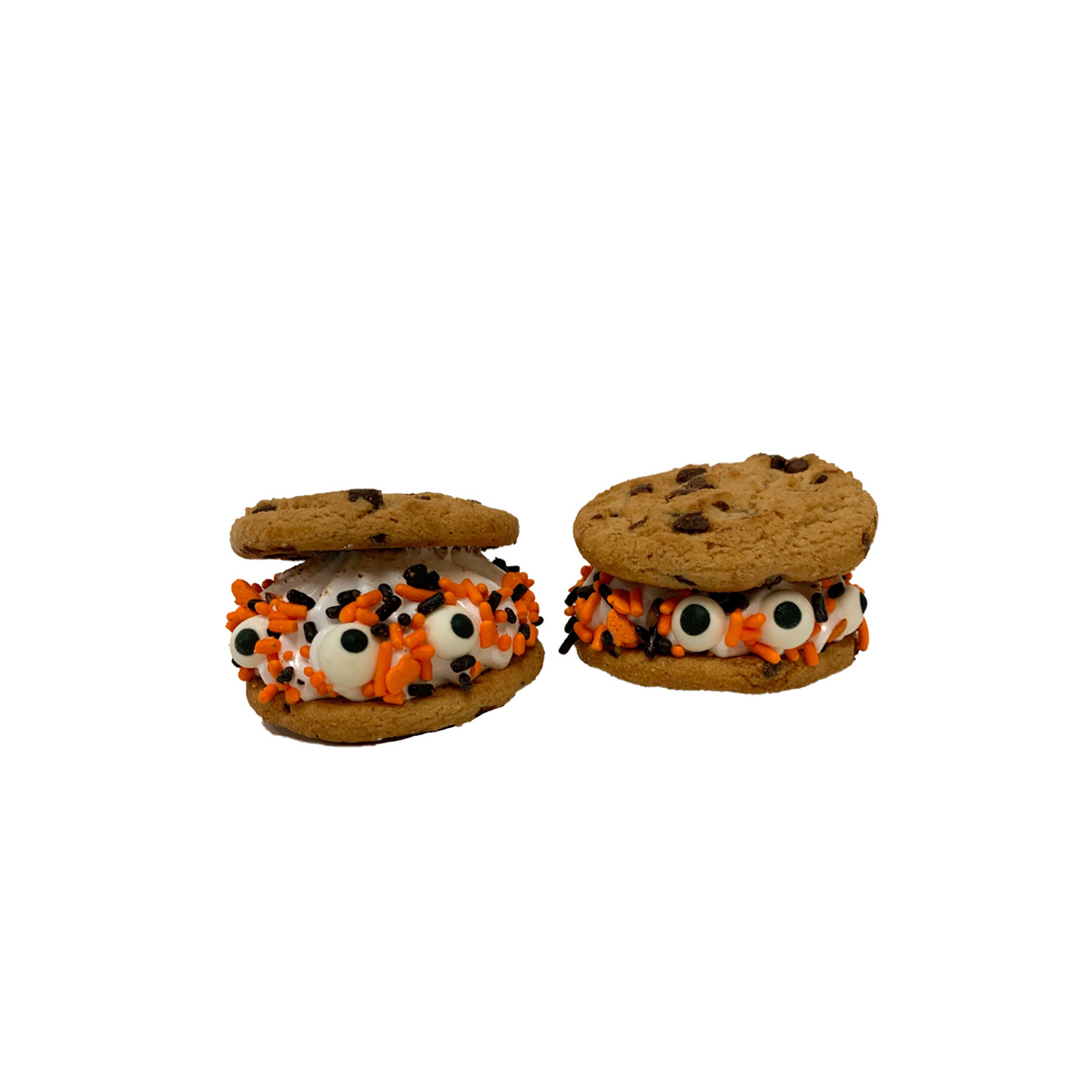 two vanilla marshmallow with orange and black sprinkles and sugar eyes between two chocolate chip cookies