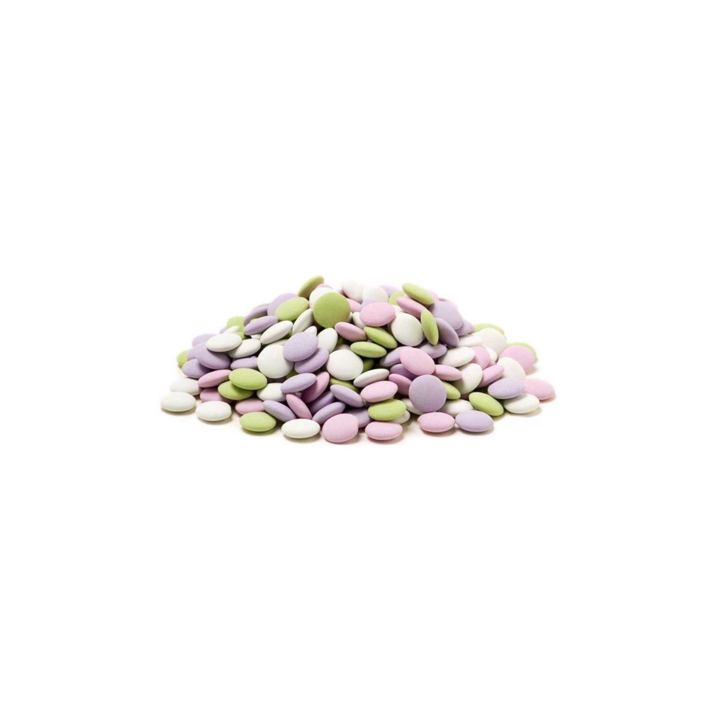 Pastel-colored candy buttons on a white background