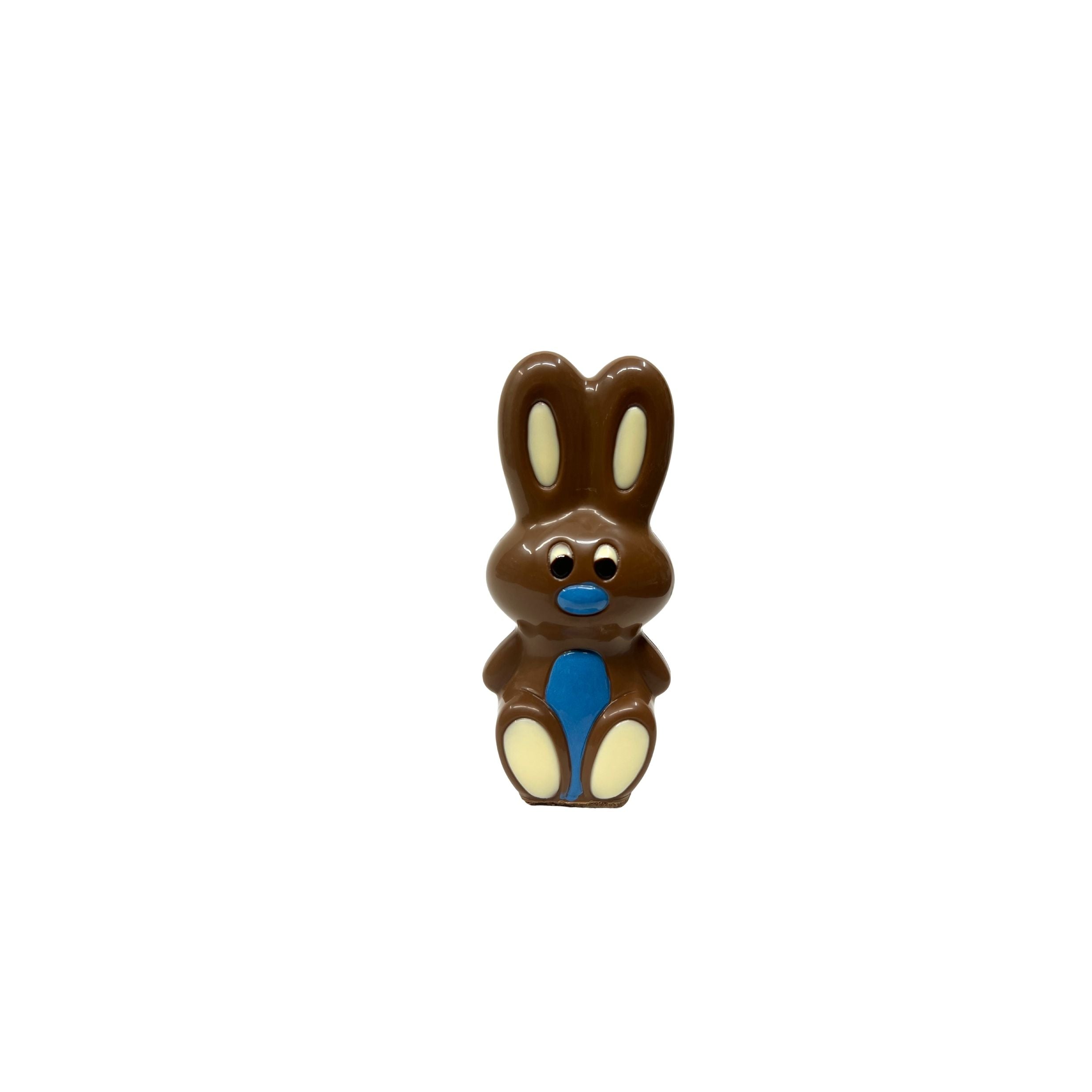 Chocolate bunny with blue face on a white background