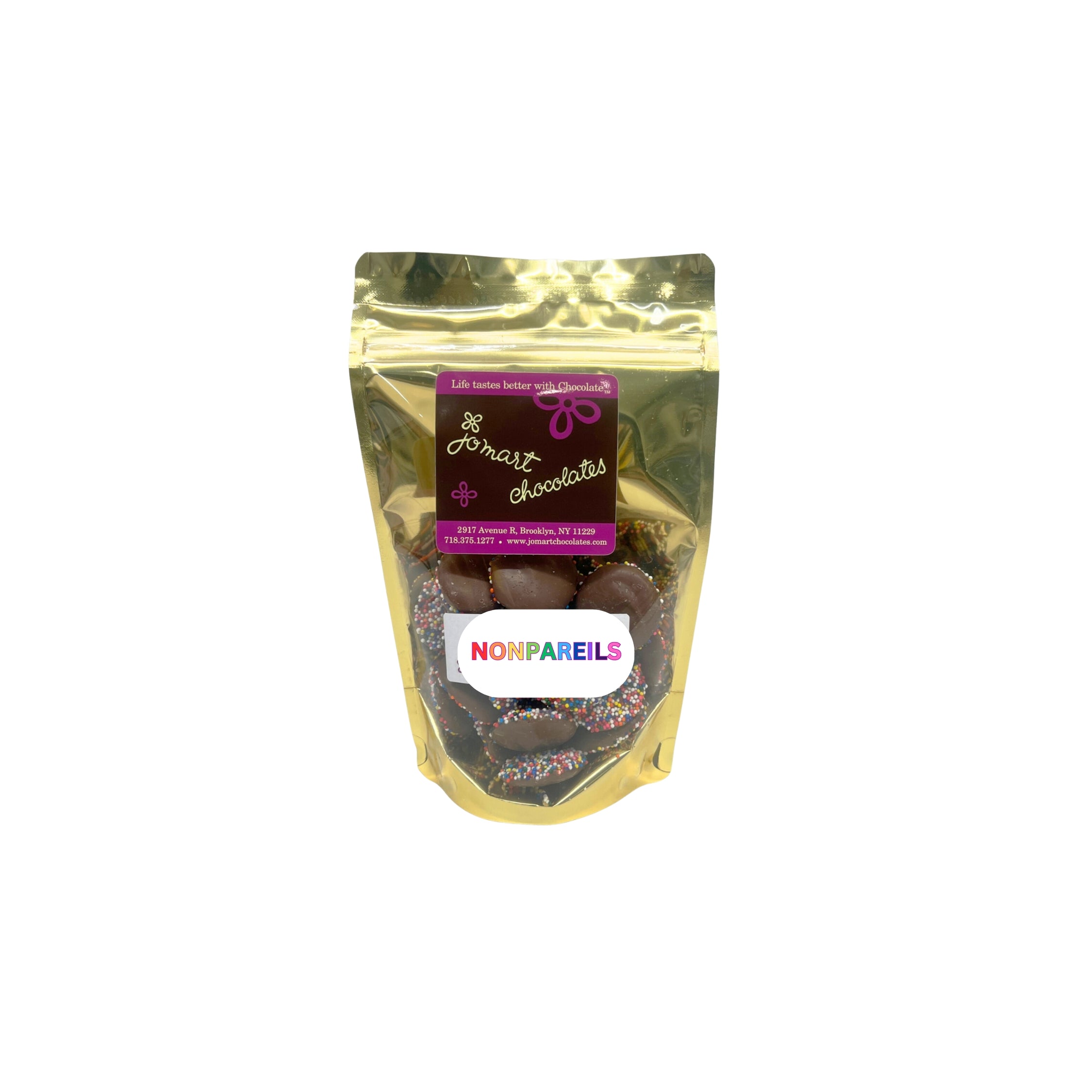 Gold packaging of nonpareils with a visible brand label on a white background