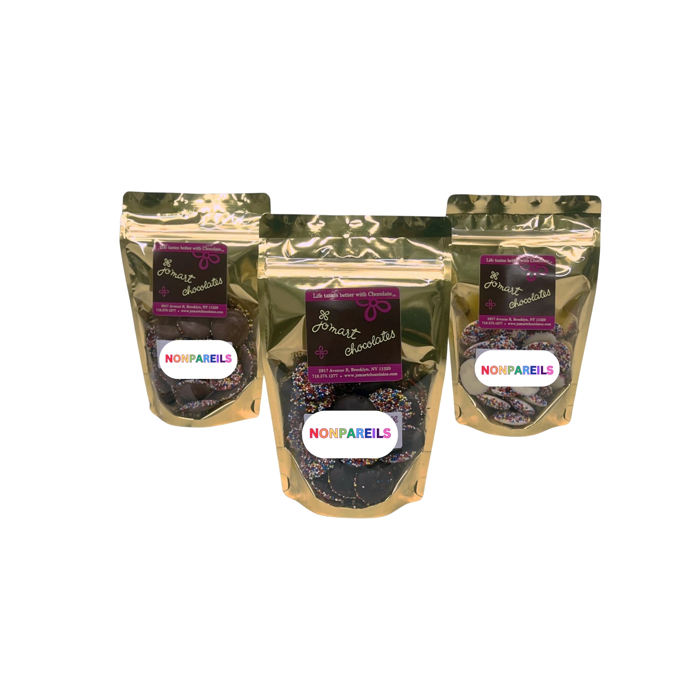 Three packages of 'Nonpareils' chocolate on a white background