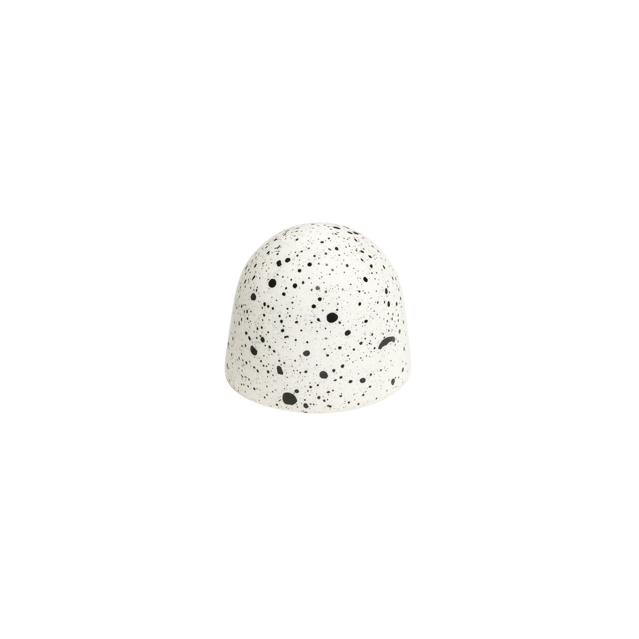 white dome with black speckles on a white background
