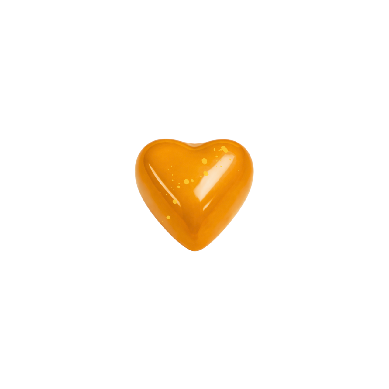 Heart-shaped orange candy on a white background