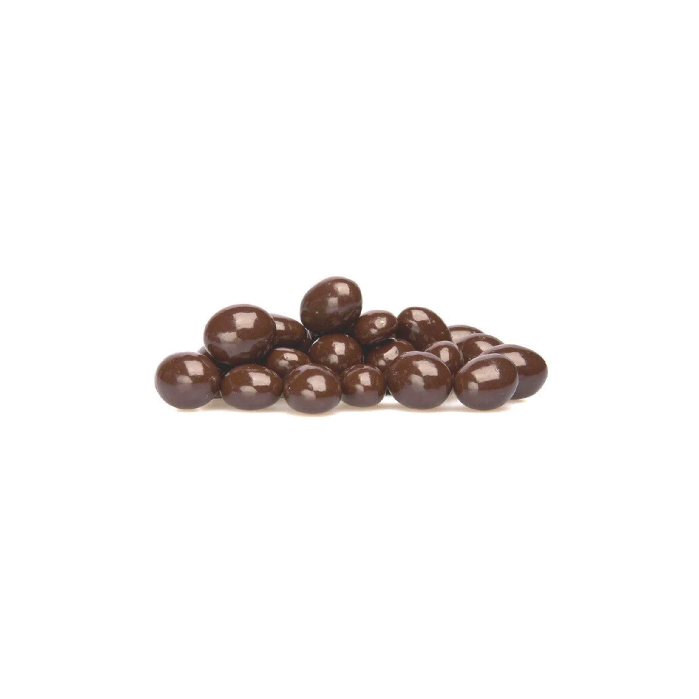 Brown chocolate candies on a white background