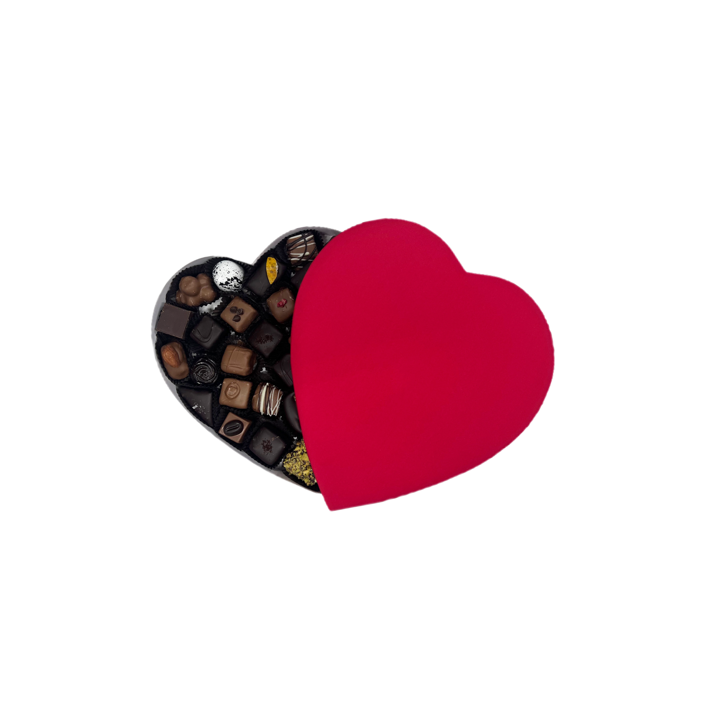 Heart-shaped chocolate box with a red lid on a white background