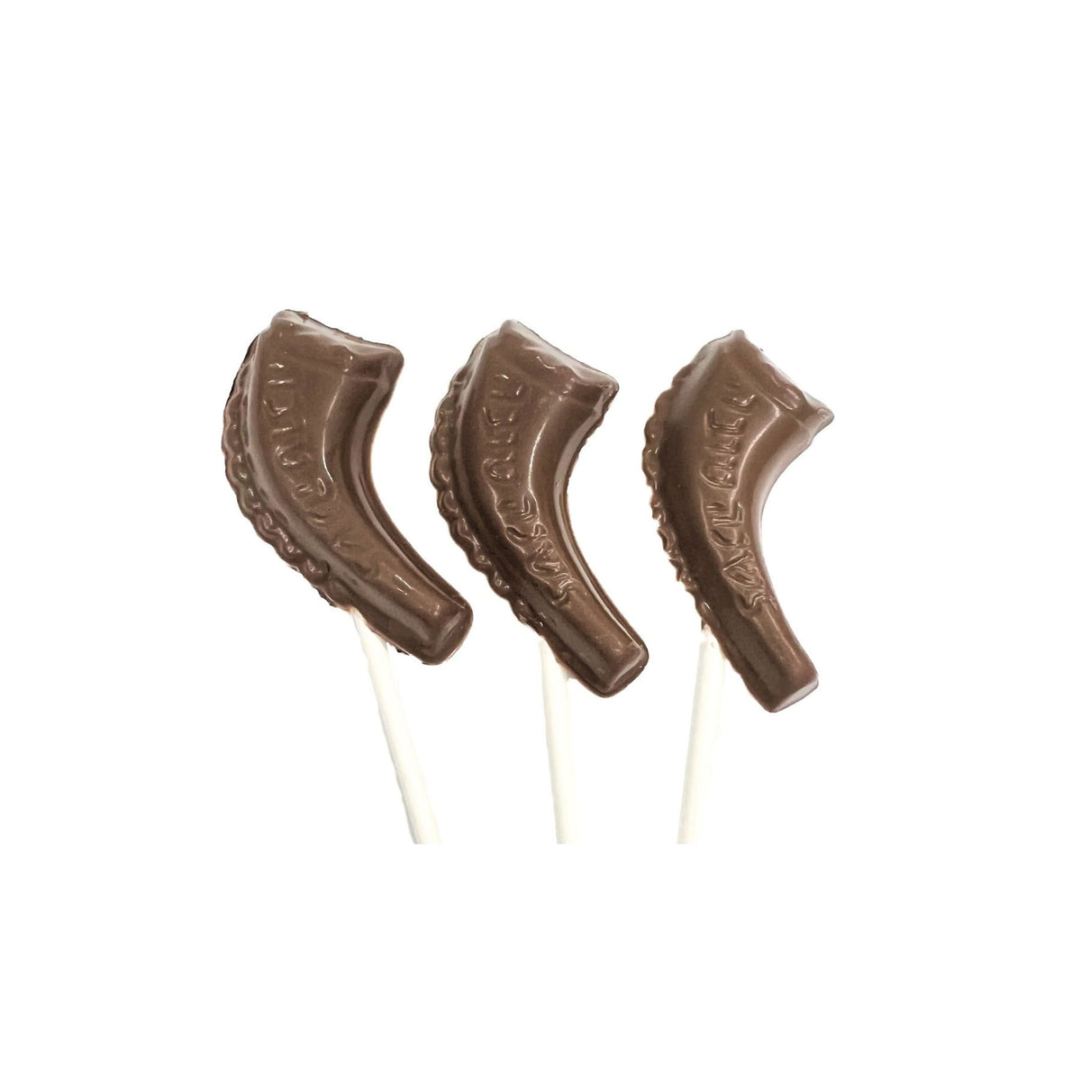 Three chocolate shofar lollipops on white sticks, arranged side by side on a plain white background.