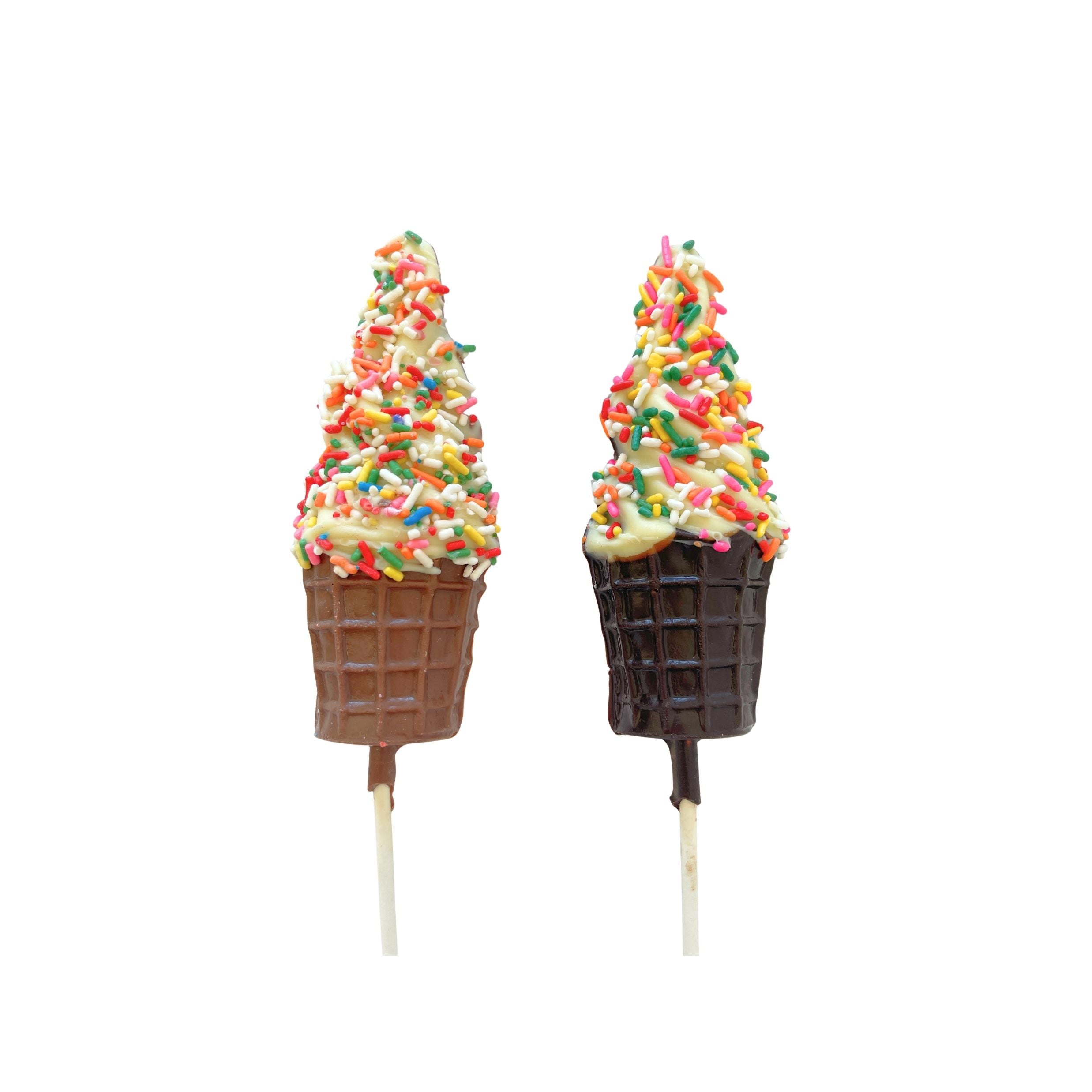 Two chocolate ice cream cone lollipops on sticks, one with a brown waffle cone and the other with a dark brown chocolate cone, both topped with white chocolate and colorful sprinkles, on a white background.