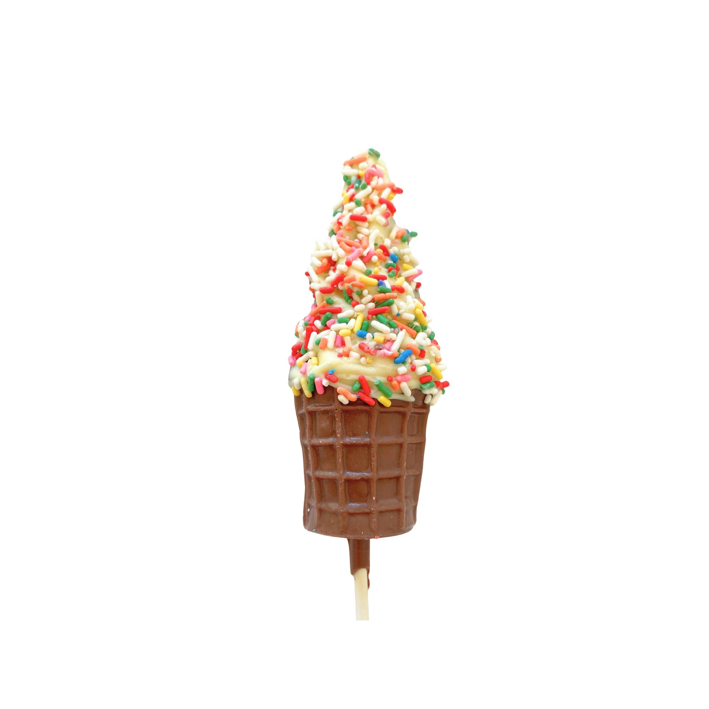 A chocolate ice cream cone on a stick, filled with soft-serve style chocolate and topped with colorful sprinkles, isolated on a white background.